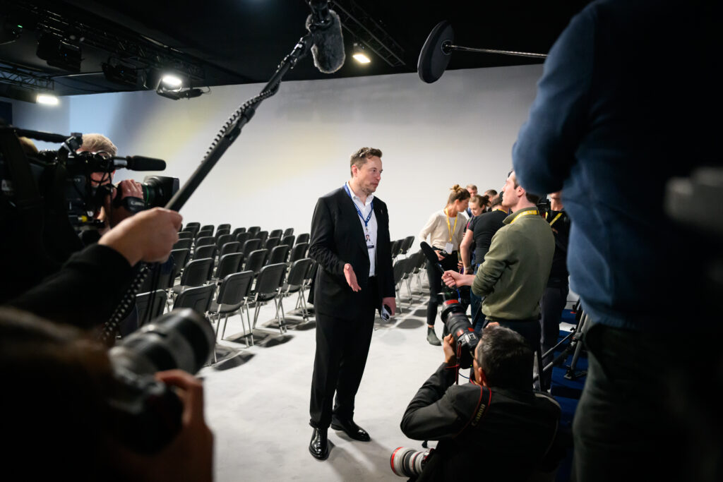 Picture of Elon Musk in a video interview which is referenced in the blog by the author.